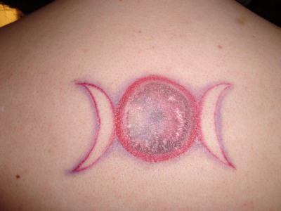 Pink Pagan Triple Moon Tattoo On Upper Back