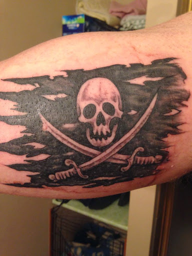 Pirate Skull Flag Tattoo On Arm