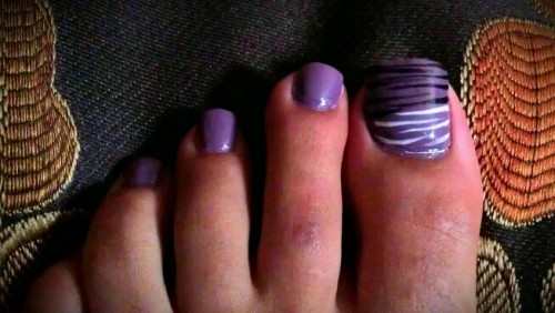 Pretty Purple Toe Nails With Zebra Print Nail Art
