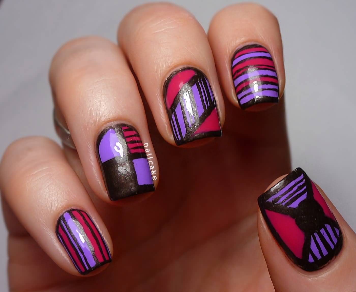Purple And Red Geometric And Striped Nail Art