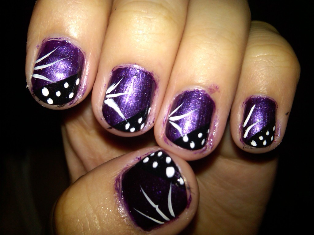 Purple Nails With Black And White Dots Nail Art