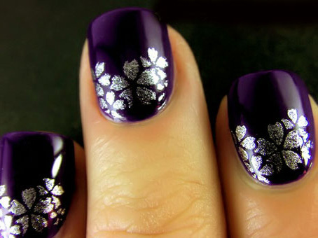 Purple Nails With Silver Flowers Nail Art