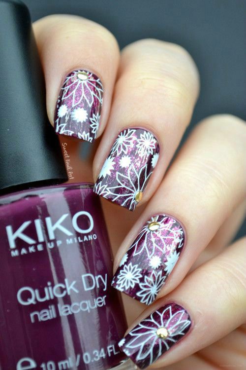 Purple Nails With White Flowers Nail Art