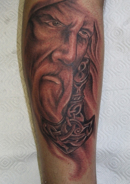 Realistic Pagan God Tattoo On Arm Sleeve
