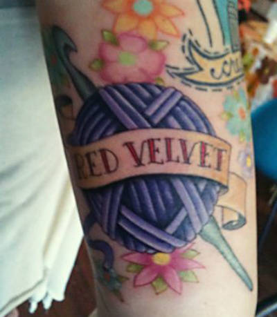 Red Velvet Yarn With Crochet Hook Tattoo On Half Sleeve