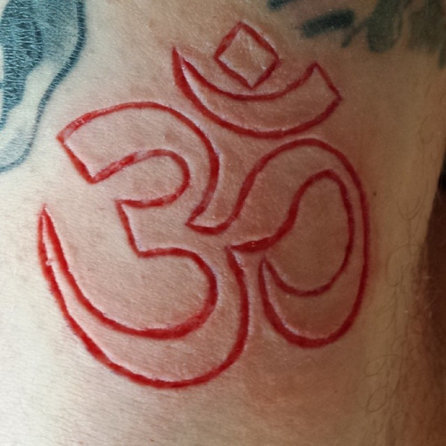 Religious Om Word In Hindi Scarification Tattoo