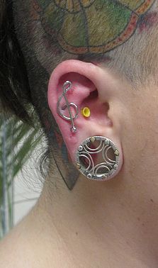 Right Ear Lobe And Ear Project Piercing With Violin Key Stud