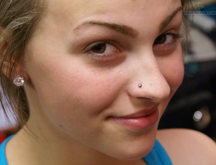 Right Ear Lobe And High Nostril Piercing For Beautiful Girls