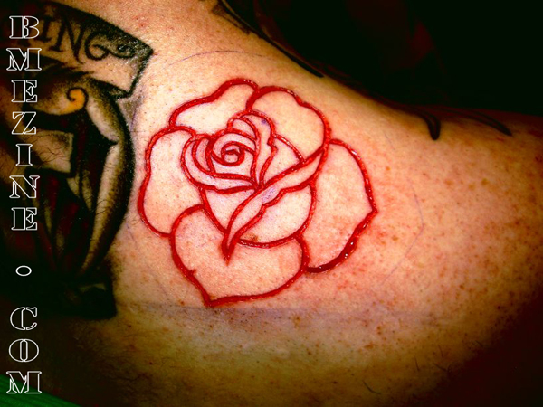 Rose Scarification Tattoo