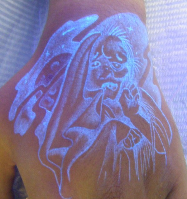 Scared Person UV Tattoo On Hand