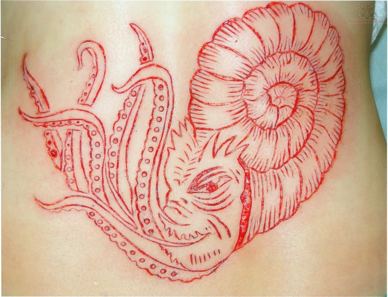 Scarification Insect Tattoo