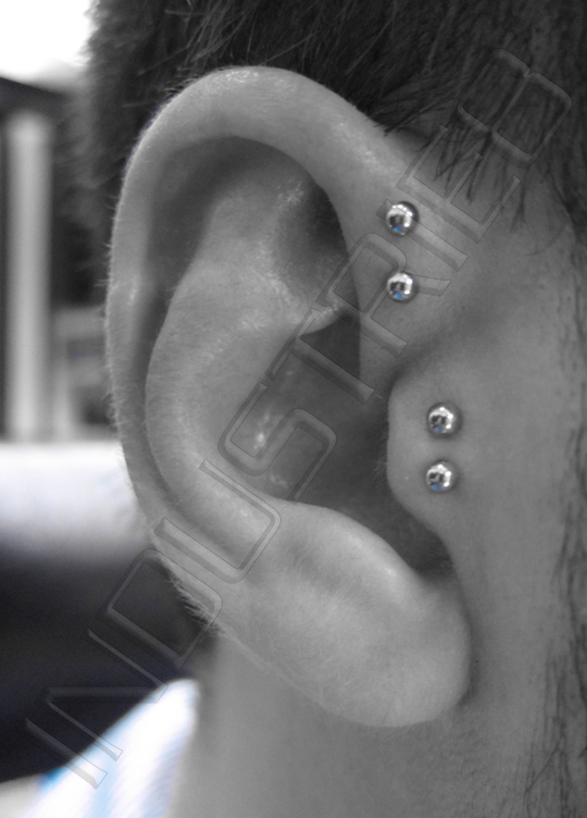Silver Studs Double Tragus Piercings On Right Ear