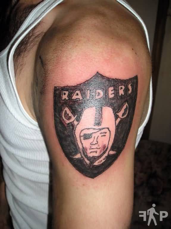 Simple Oakland Raiders Logo Tattoo On Left Shoulder.