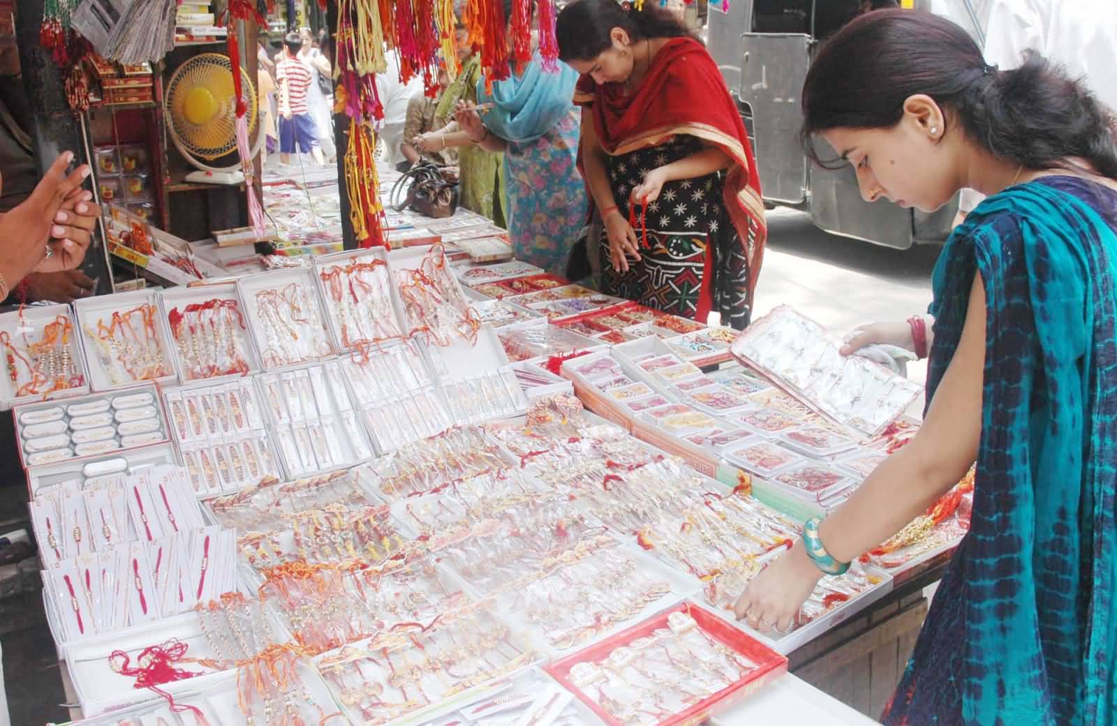 Sisters Purchasing Rakhis For Brothers On Raksha Bandhan