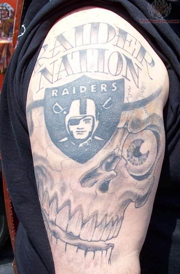 Skull And Oakland Raiders Logo Tattoo On Right Half Sleeve