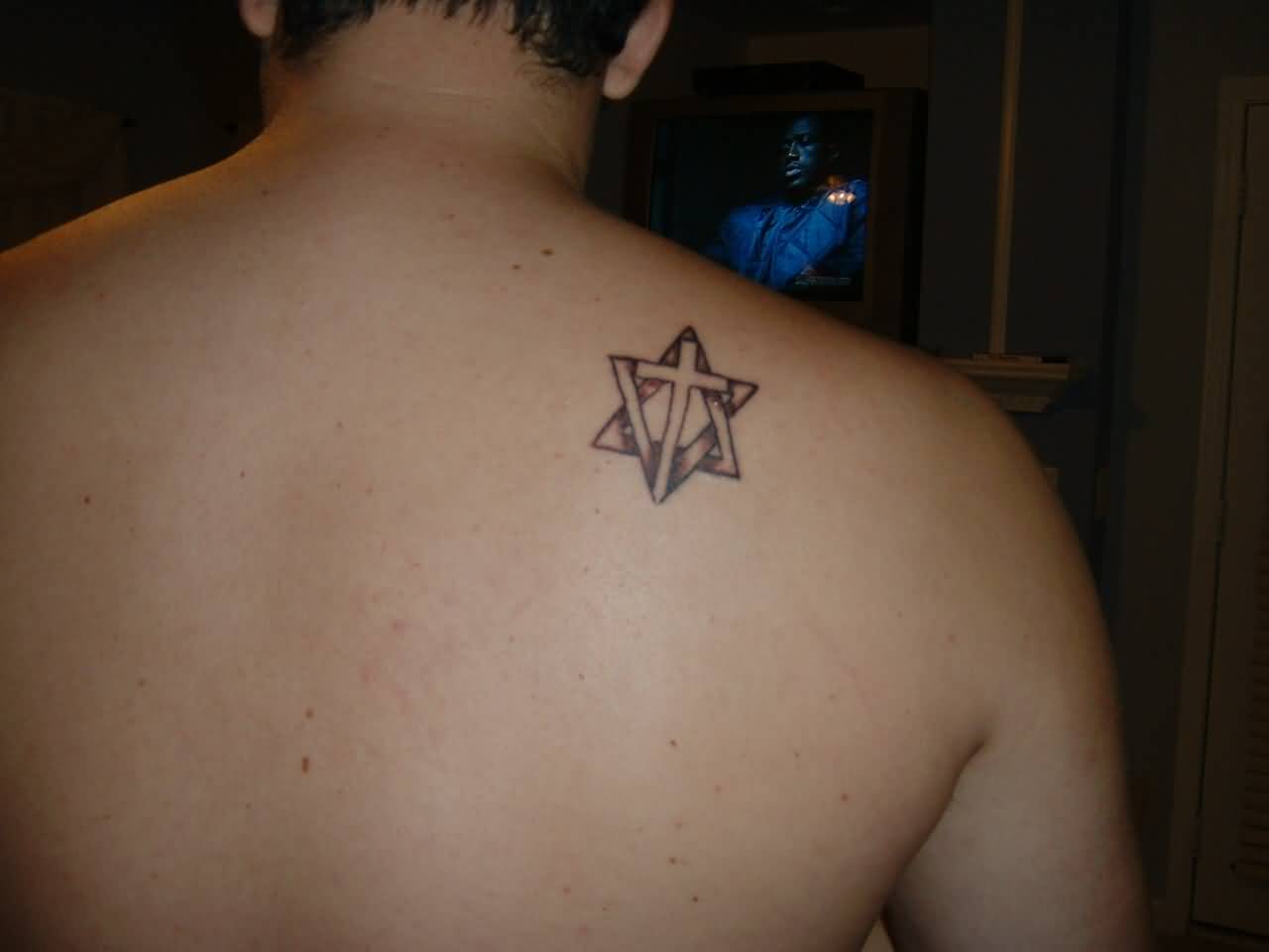 Small Cross With David Star Tattoo On Upper Back