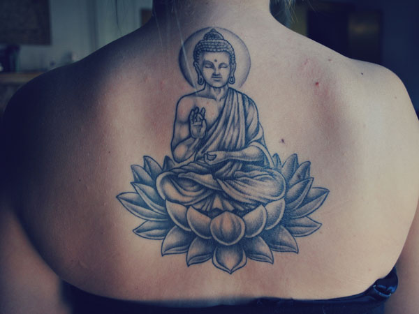 Spiritual Buddha Sitting On Lotus Tattoo On Upper Back For Women