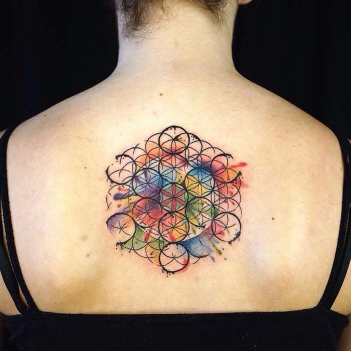Spiritual Flower Of Life Watercolor Tattoo On Upper Back