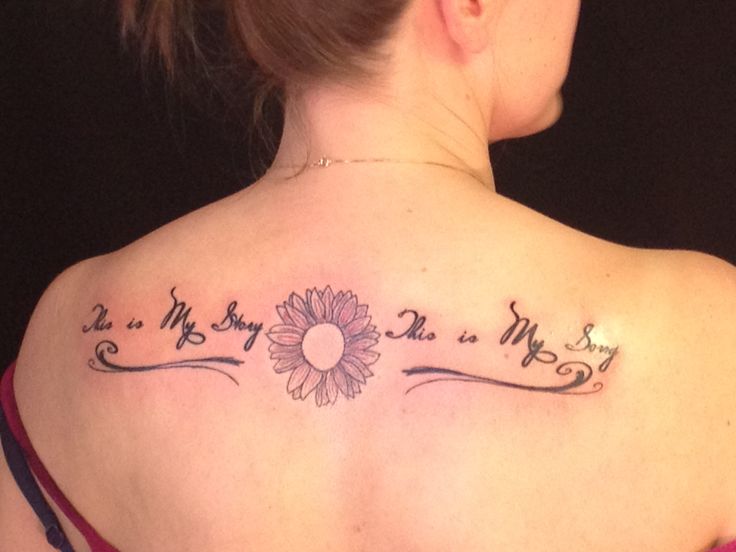 Spiritual Flower Symbol Tattoo On Upper Back For Girls