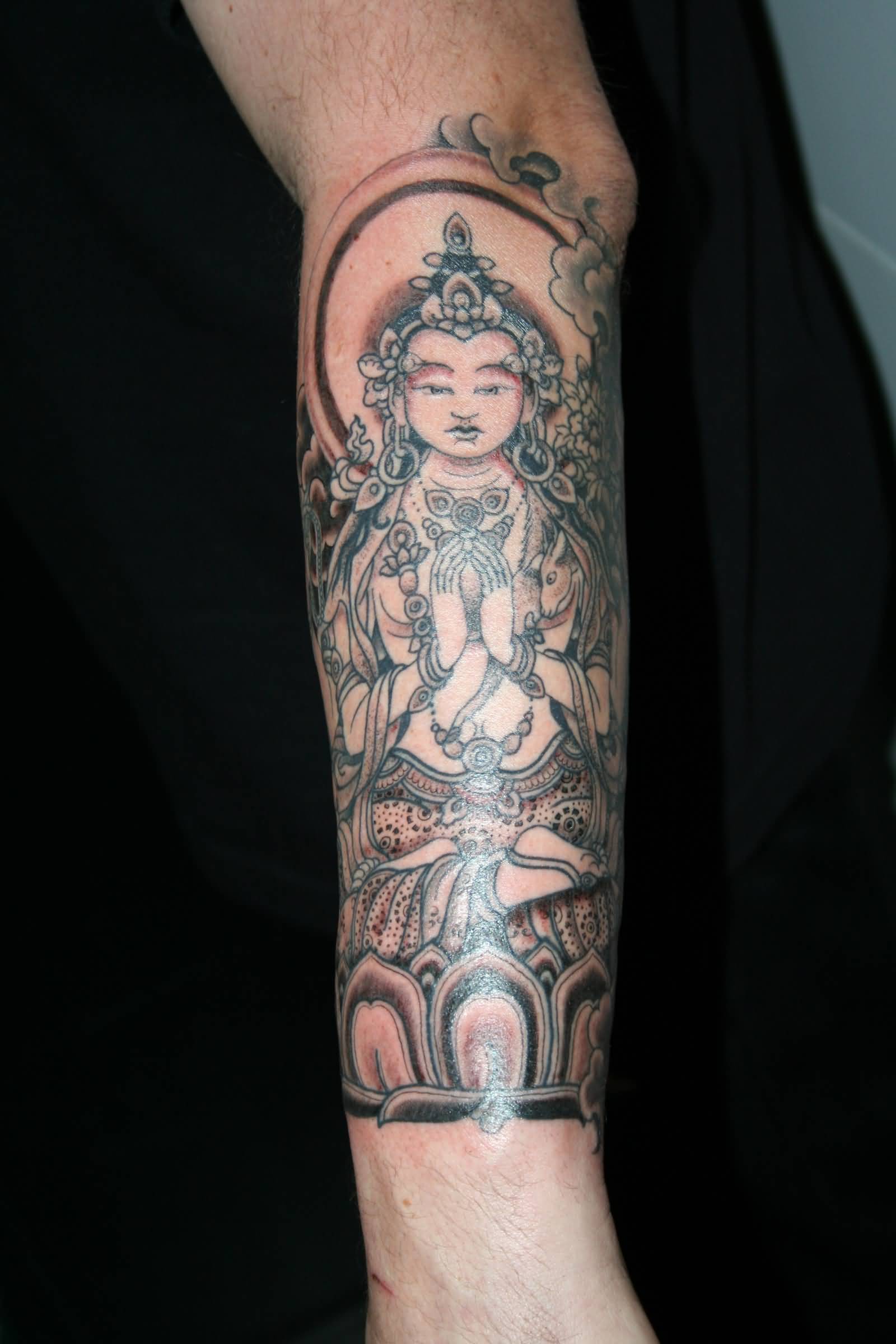 Spiritual Tibetan Tattoo On Arm Sleeve