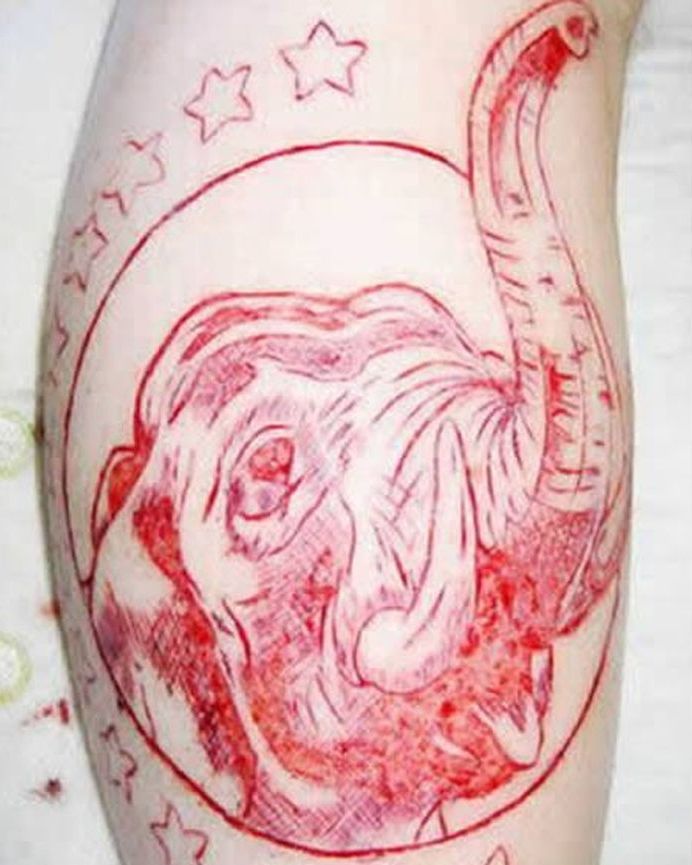 Star Elephant Scarification Tattoo