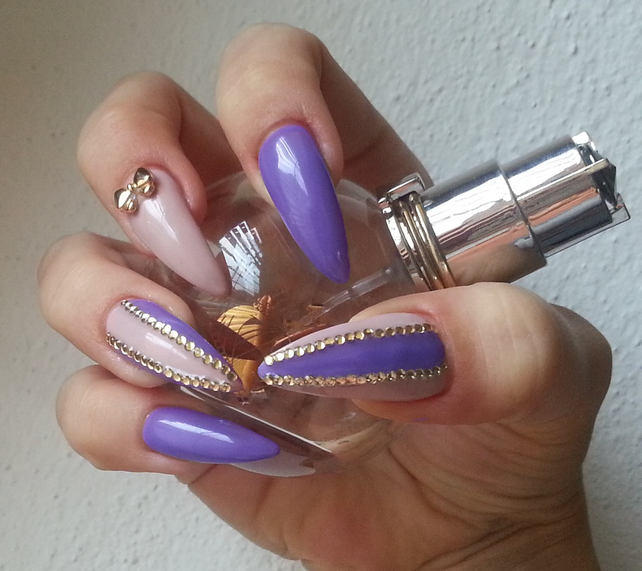 Stiletto Purple Nail Art With Metallic Bow Design Idea