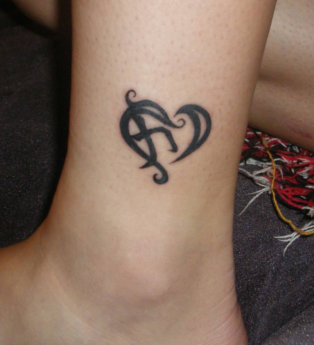 Strength Heart Symbol Tattoo On Ankle
