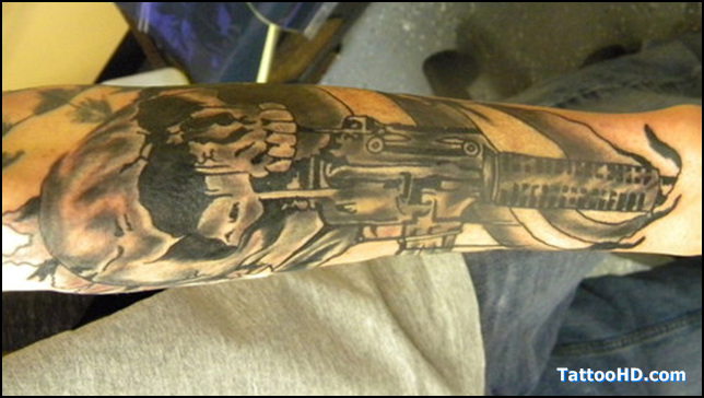 Terrific Army Skull With Weapon Tattoo On Arm Sleeve