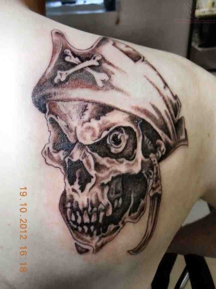 Terrific Grey Pirate Skull Tattoo On Right Back Shoulder