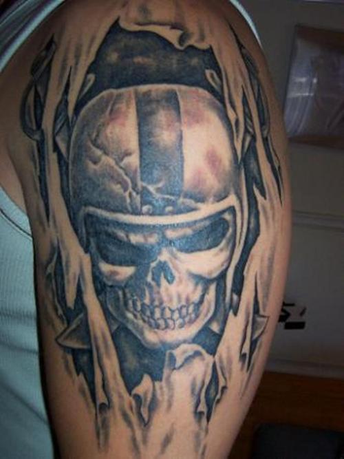 Terrific Oakland Raiders Skull Ripped Skin Half Sleeve Tattoo