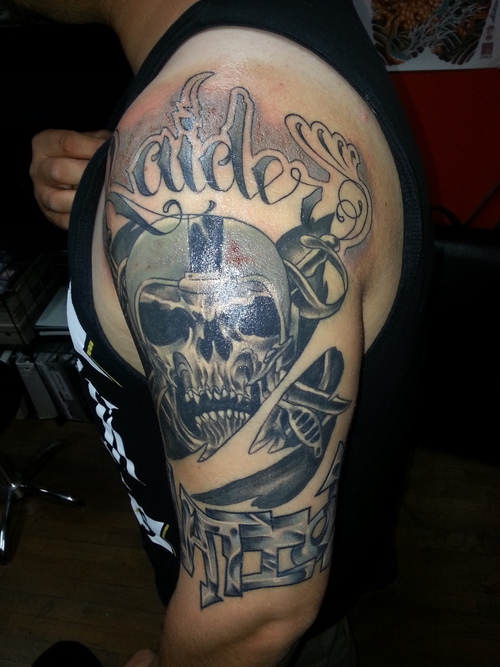 Terrific Oakland Raiders Tattoo On Left Half Sleeve