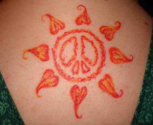 Tibetan Peace And Love Symbol Tattoo