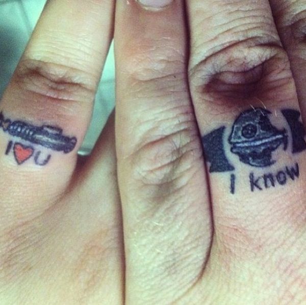 Tiny Weapons Tattoos On Fingers
