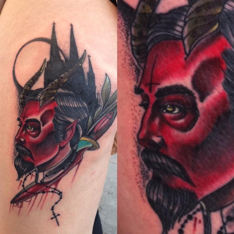 Traditional Red Face Devil Tattoo On Left Half Sleeve