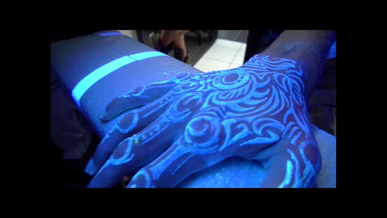 Tribal UV Tattoo On Left Hand