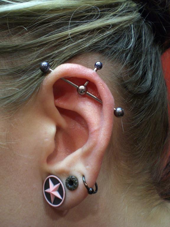 Triple Ear Lobe And Industrial Ear Project Piercing