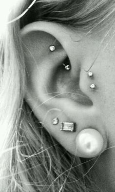 Triple Lobe And Double Tragus Piercing