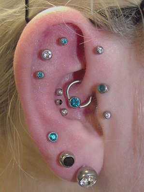 Triple Lobes And Ear Project Piercing On Right Ear