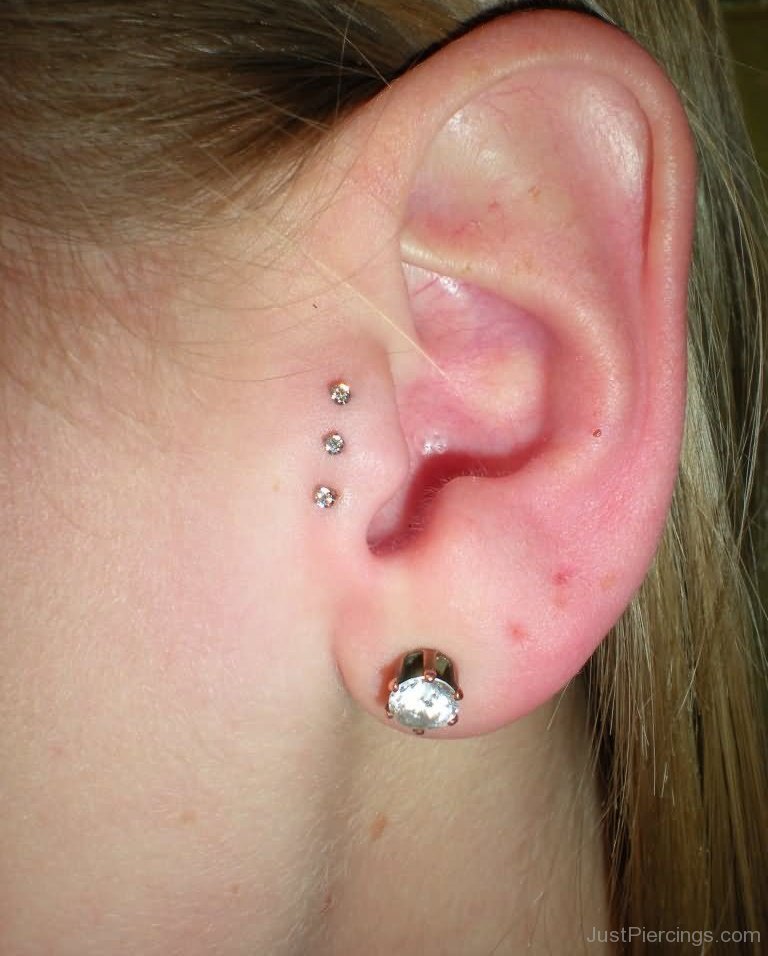 Triple Tragus Piercing With Small Anchors