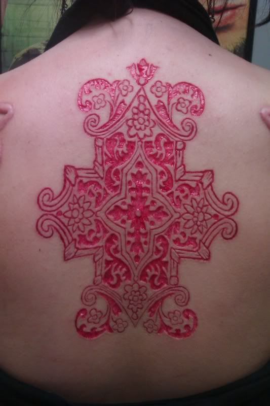 Unique Scarification Tattoo On Upper Back