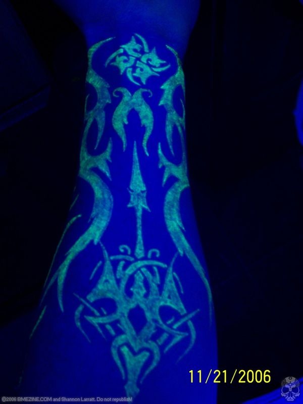 Unique Symbol UV Tattoo On Arm Sleeve