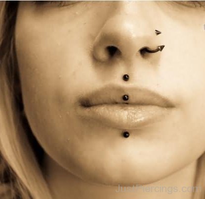 Vertical Upper Lip and High Nostril Piercing