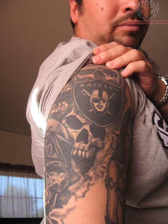Very Nice Oakland Raiders Logo And Skull Tattoo On Right Half Sleeve