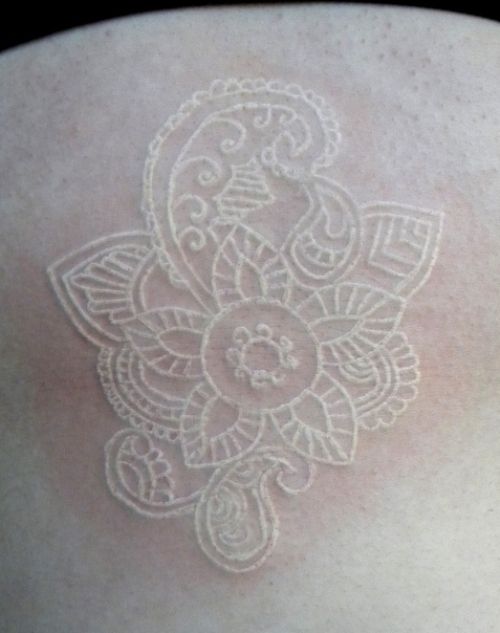 White Flower Scarification Tattoo