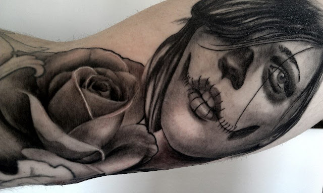 Wonderful Catrina With Rose Tattoo On Arm