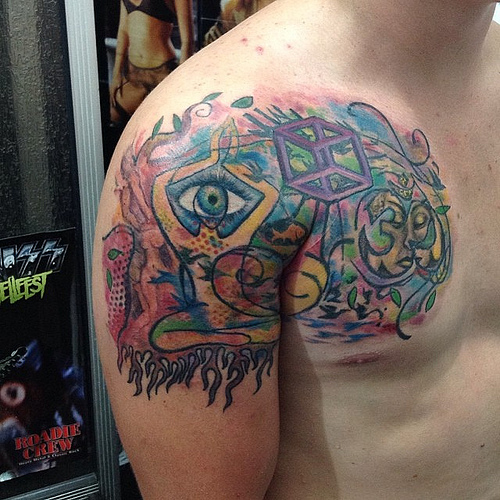 Wonderful Colored Escher Tattoo On Right Shoulder And Chest