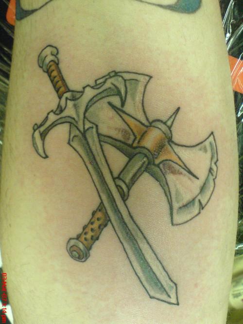 Wonderful Crossed Weapons Tattoo