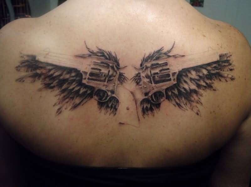 Wonderful Weapons Wings Tattoo On Upper Back