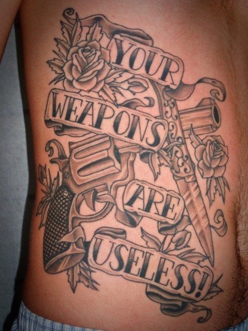 Your Weapons Are Useless Traditional Tattoo On Right Side Rib