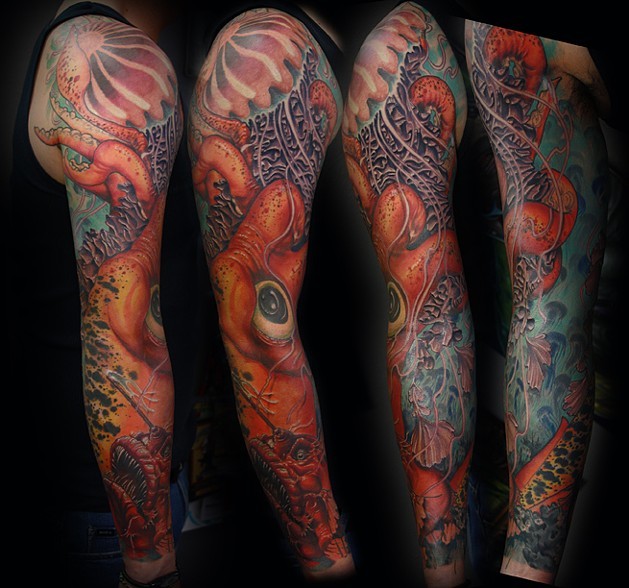 Amazing Octopus With Angler Fish Tattoo On Full Sleeve